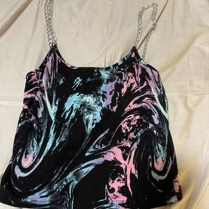 Swirling too with chain sleeves